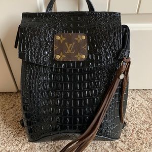 Upcycled market croc backpack